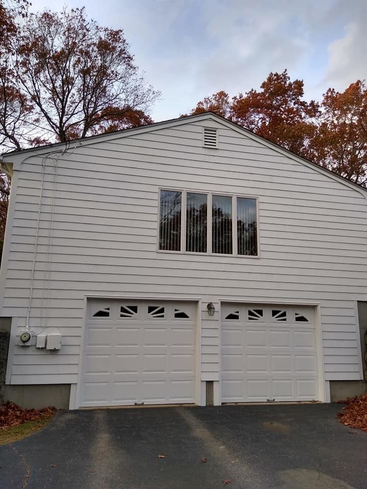 Garage door painting and garage exterior repaint by Genesis Painting