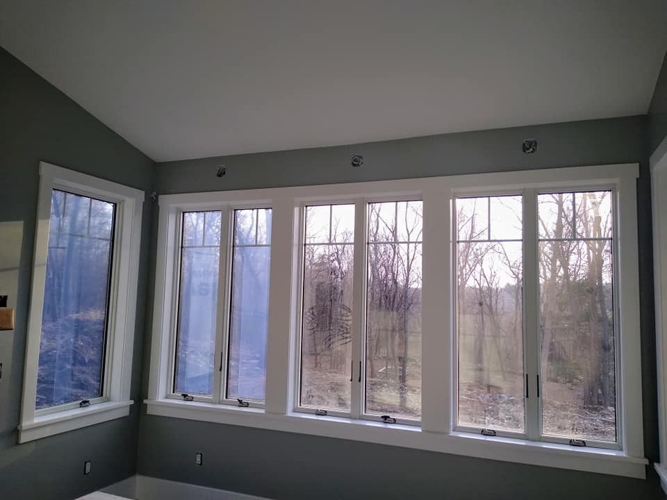 Smooth painted ceiling from a Genesis Painting interior repaint (popcorn ceiling removal ends with a finish like this)